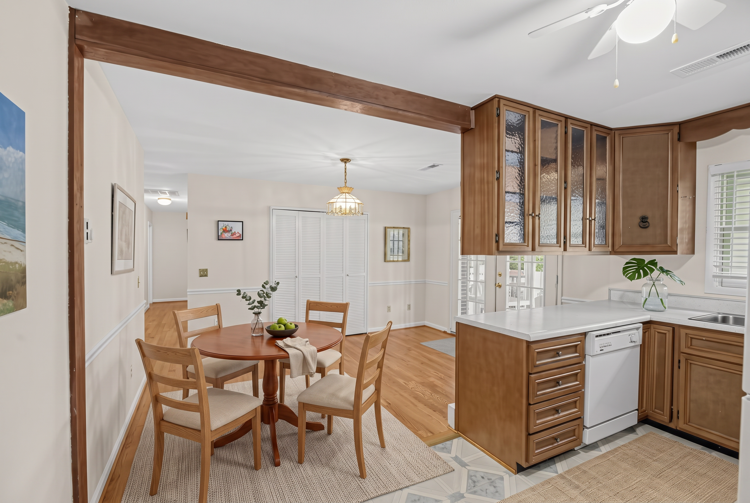 Virtually staged kitchen with dining table and styling